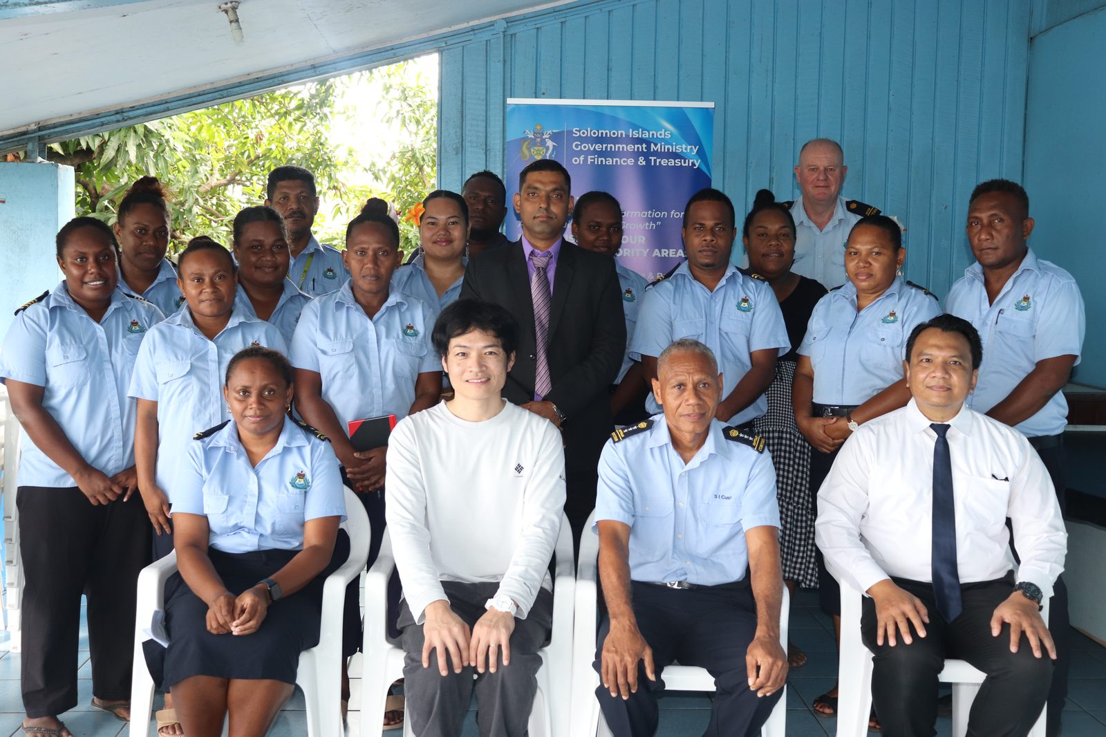 SICED officers with Ministry of Finance and Treasury representatives at a training session